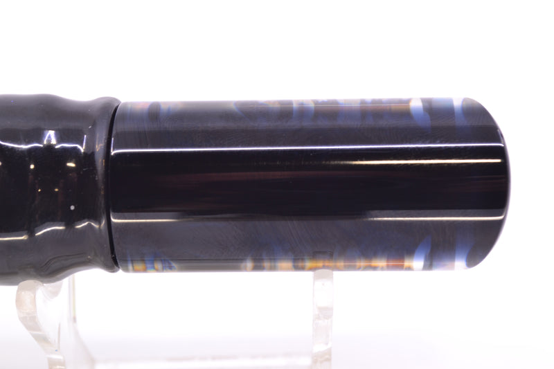 Moyes Lures S&P Black Back Taxi Eyes Small Pipe Bomb 9" 4oz Skirted Black-Silver/Rainbow